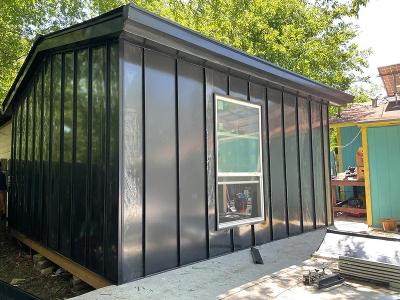 Black standing seam metal wall panels for Metal Roof Installation in Centennial